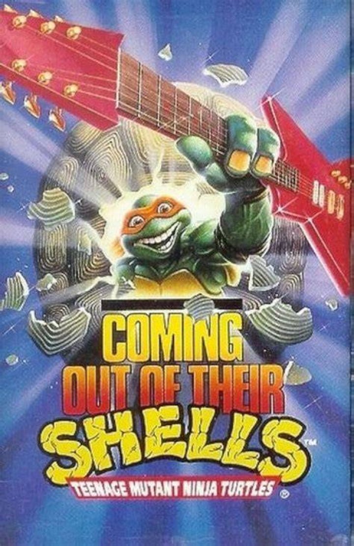 The Ninja Turtles coming out of a manhole against the New York City skyline